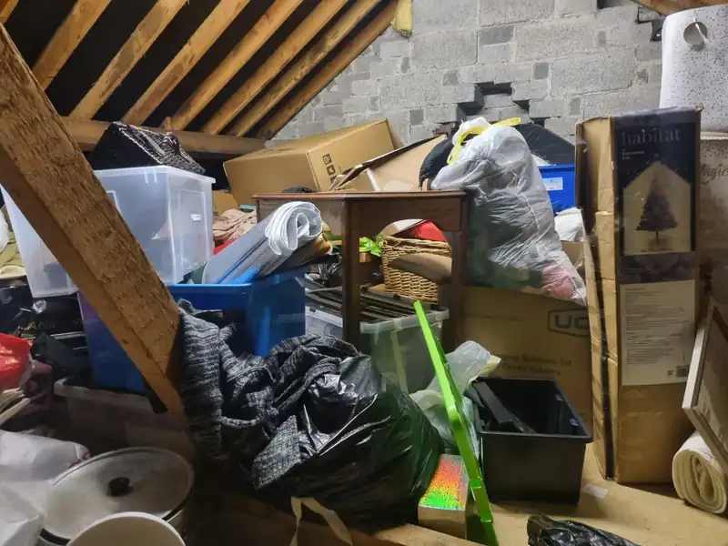 Attic in Foxrock packed with boxes and bags before clearance by Property Clearance